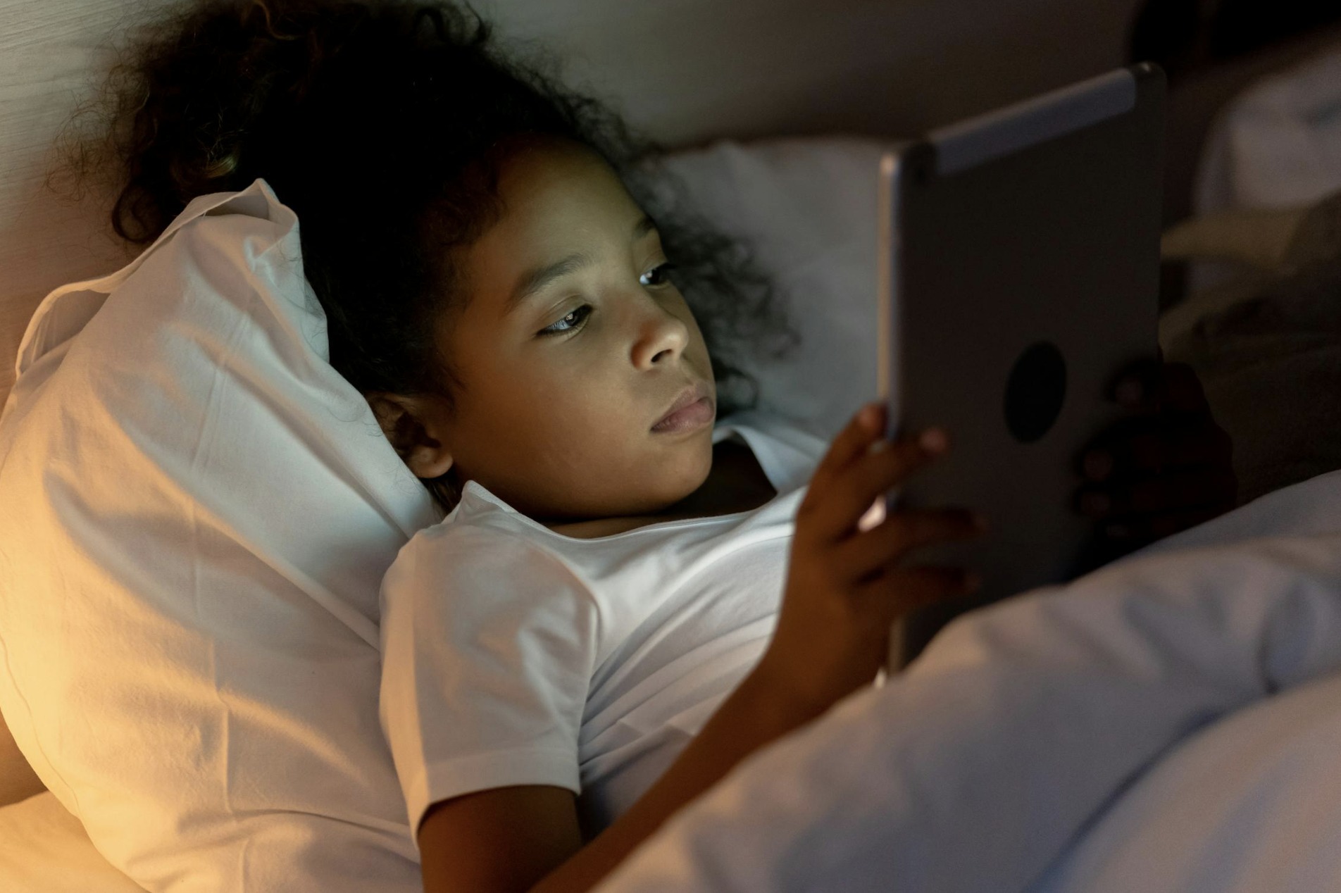 African american girl on tablet for the digital landscapes for black youth.